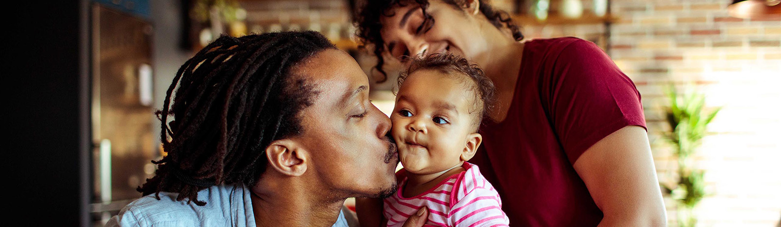 Parents and a baby at home